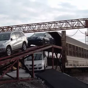 Организация доставки автомашин в железнодорожных  вагонах