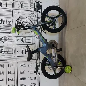 Детский велосипед Prego. Литые диски размером 16. С боковыми колесами.